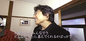 画像：バケツのお風呂に入る家