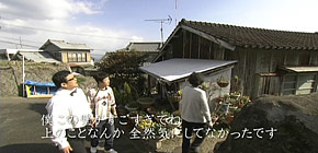画像：バケツのお風呂に入る家