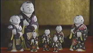 伏見人形「饅頭喰い」（伏見人形窯元　丹嘉）